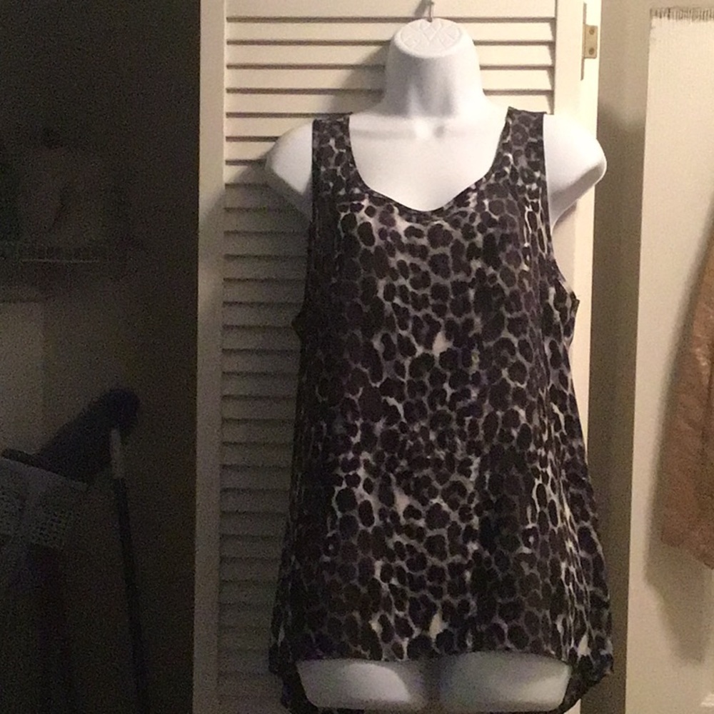 Leopard print top with slit in the back.